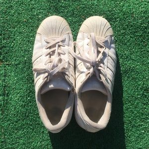 All white adidas superstars